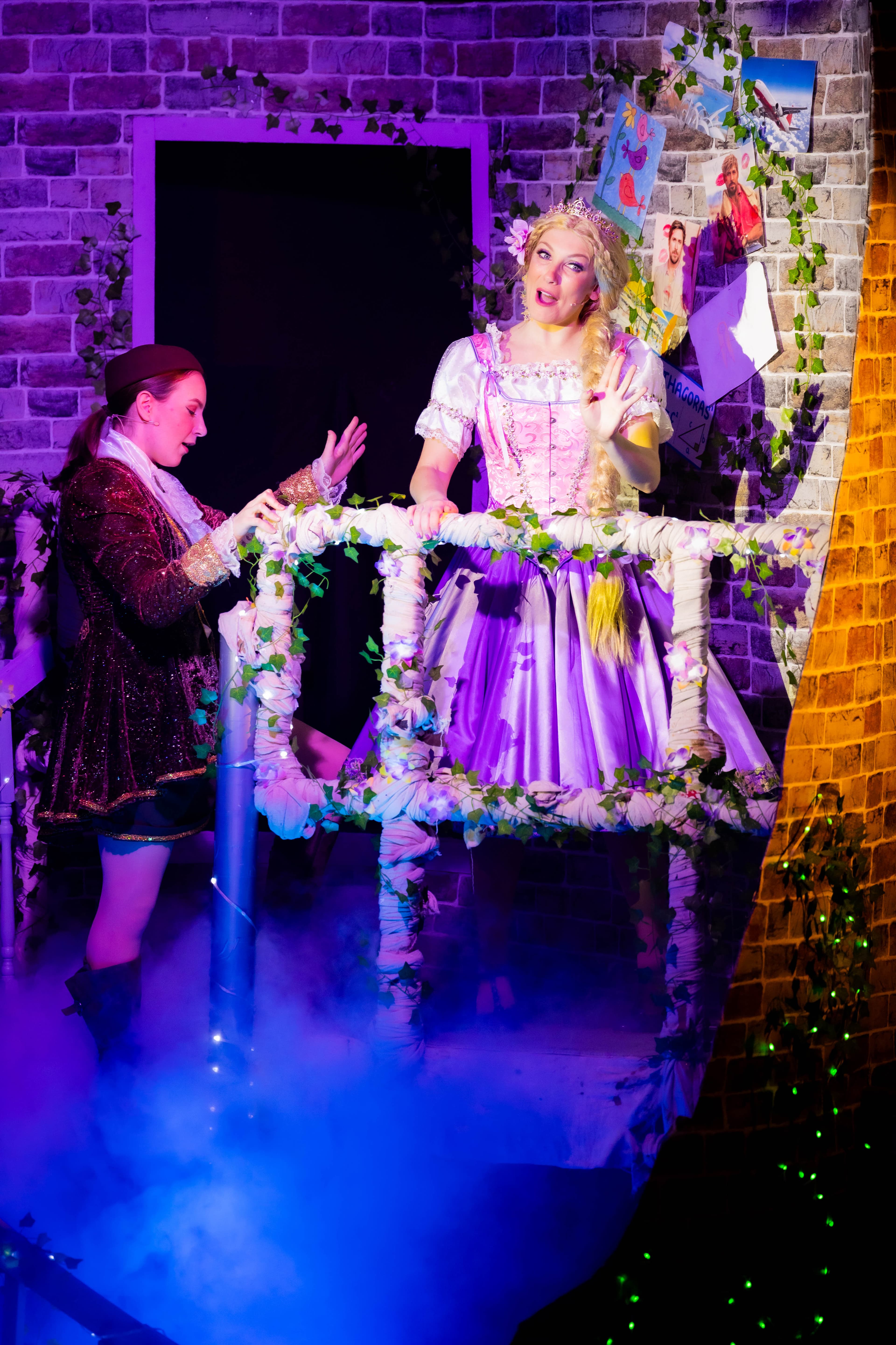 Rapunzel and Jack are seen talking in the tower. They stand atop a magical glowing cloud of blue low fog.